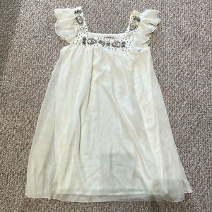 Cream flowy mini dress with jeweled detail, sz M